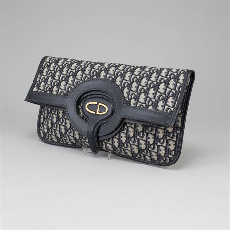 christian dior fold over clutch.